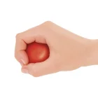 Pallina per la riabilitazione della mano strong Tecniwork chiusa nella mano verso giù