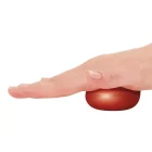 Pallina per la riabilitazione della mano strong Tecniwork pressata dal palmo della mano